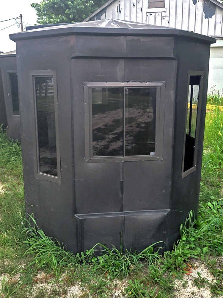 Hunting blind with 24 x 24 slide window and vertical bow windows